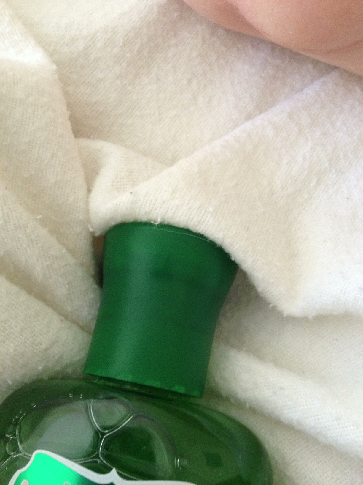 A photo captured by a person who is blind. A computer-generated caption for this photo is: A close up of a person ' s feet.