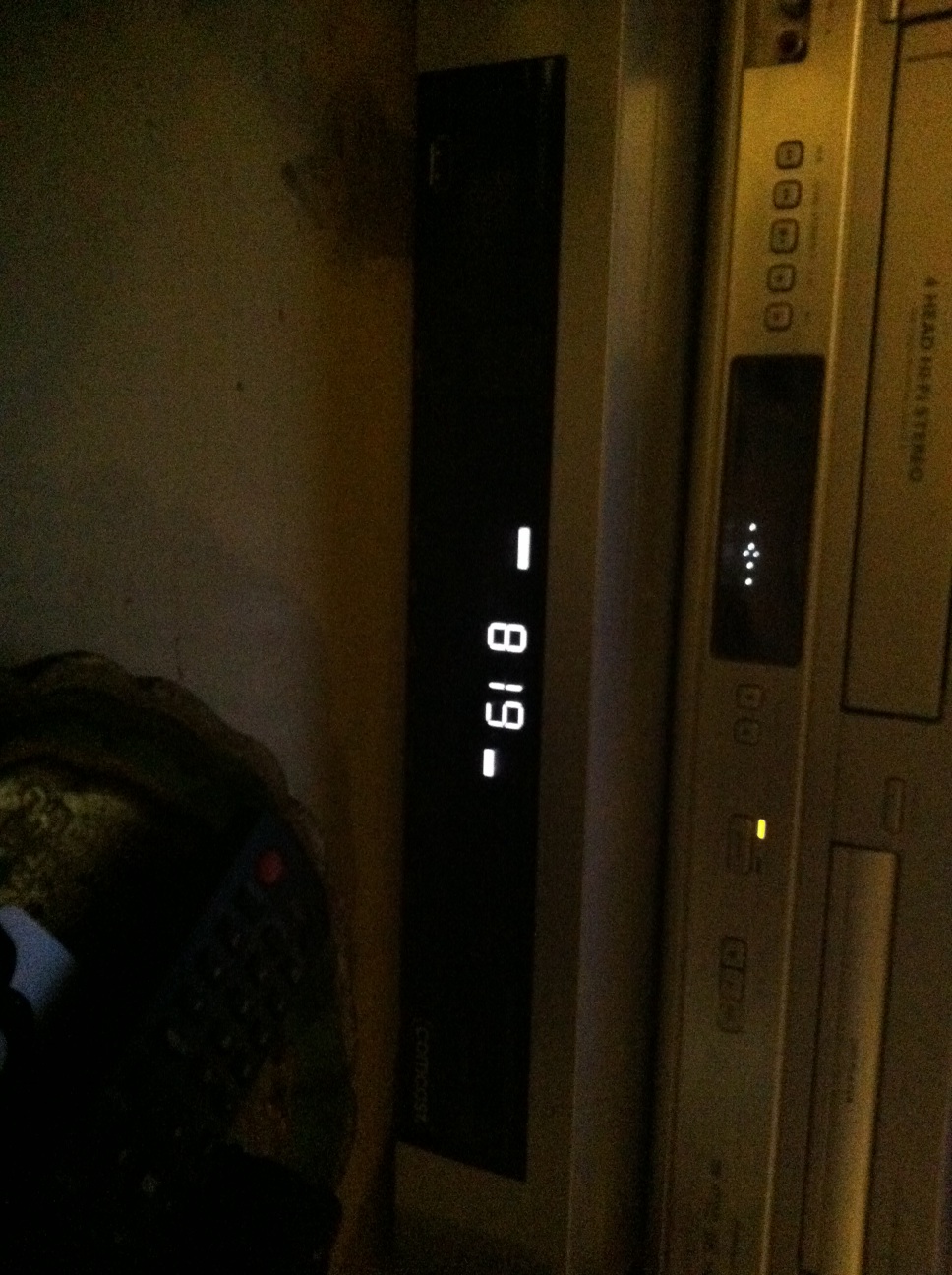 A photo captured by a person who is blind. A computer-generated caption for this photo is: A close up of a wall in a room.