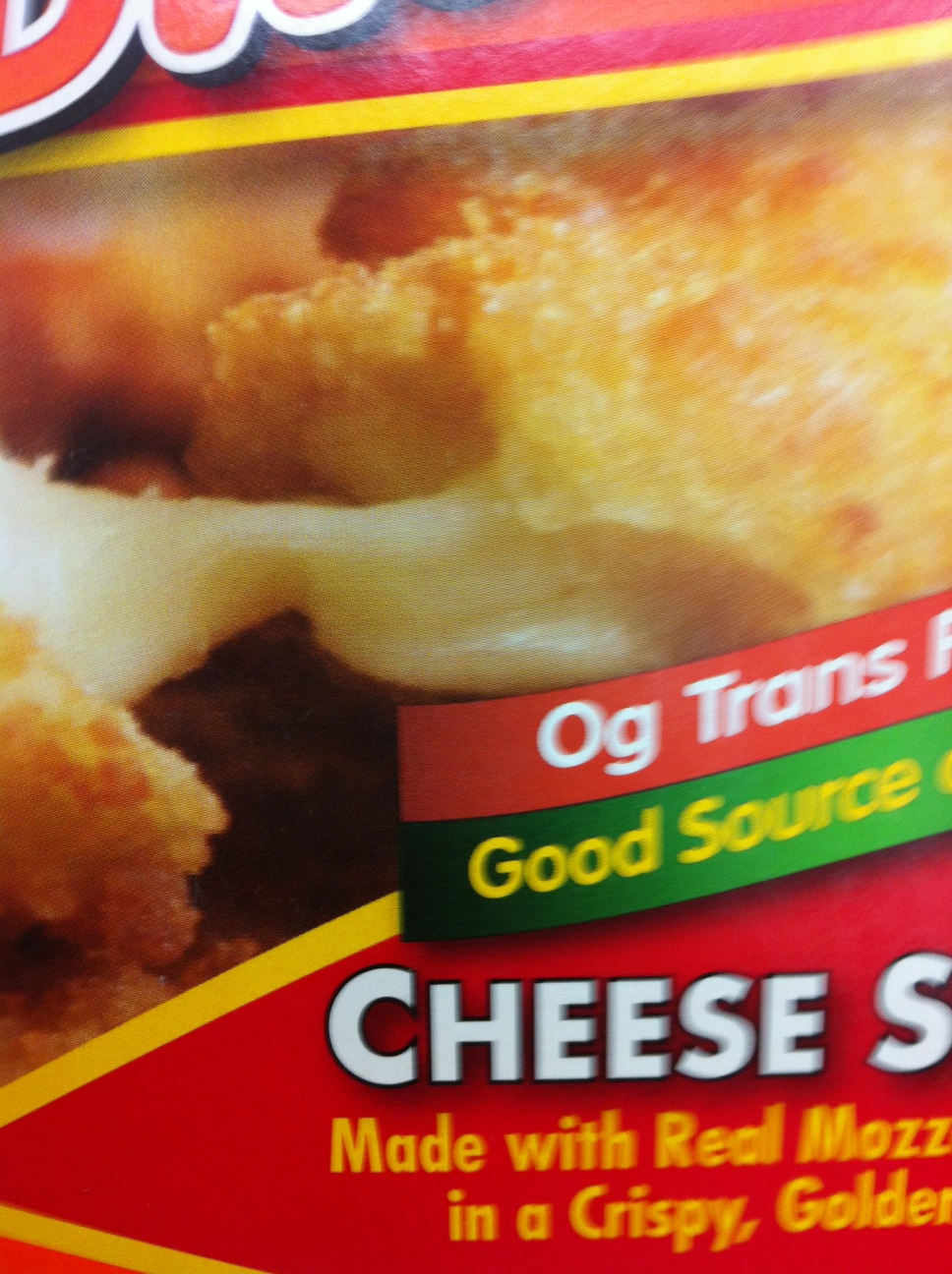 A photo captured by a person who is blind. A computer-generated caption for this photo is: A close up of a sign with food.