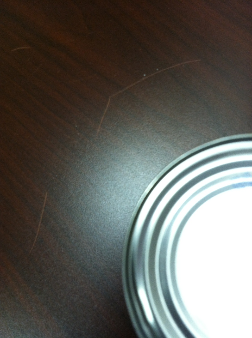 A photo captured by a person who is blind. A computer-generated caption for this photo is: A close up of a plate on a table.