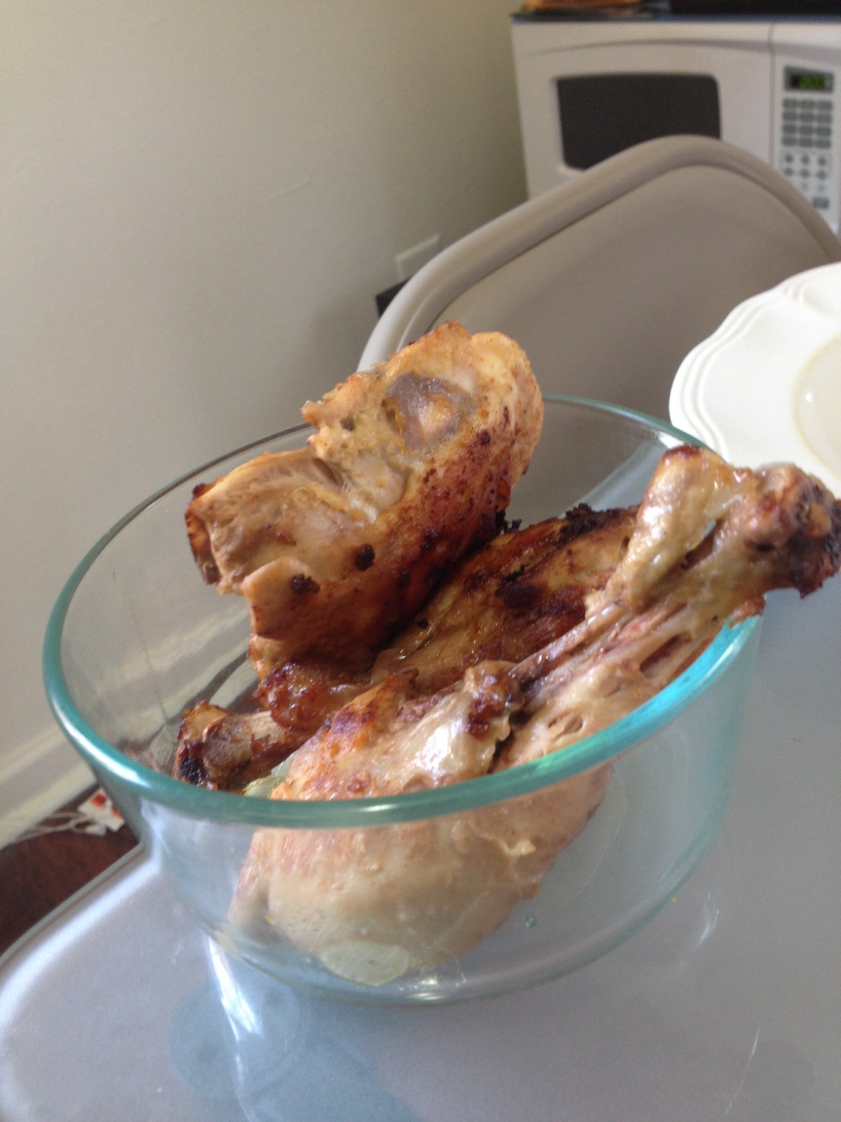 A photo captured by a person who is blind. A computer-generated caption for this photo is: A close up of a bowl of food on a plate.