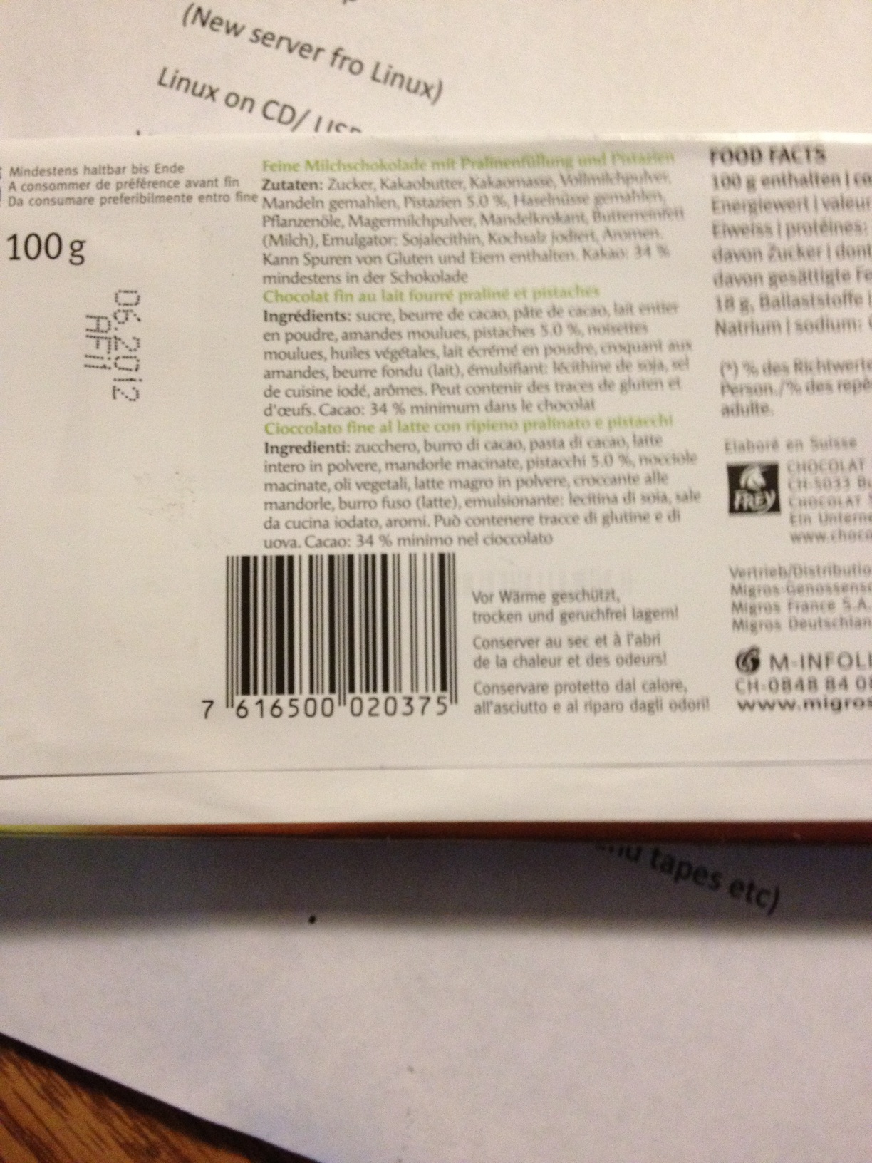 A photo captured by a person who is blind. A computer-generated caption for this photo is: There is a book on the side of a newspaper.