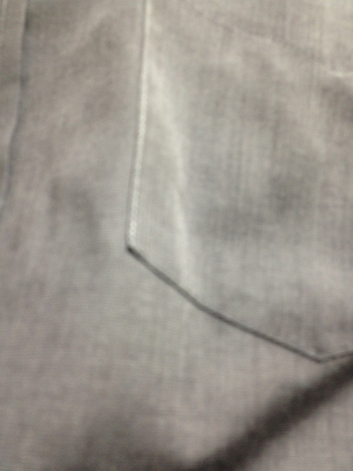 A photo captured by a person who is blind. A computer-generated caption for this photo is: A close up of a wall in the background.