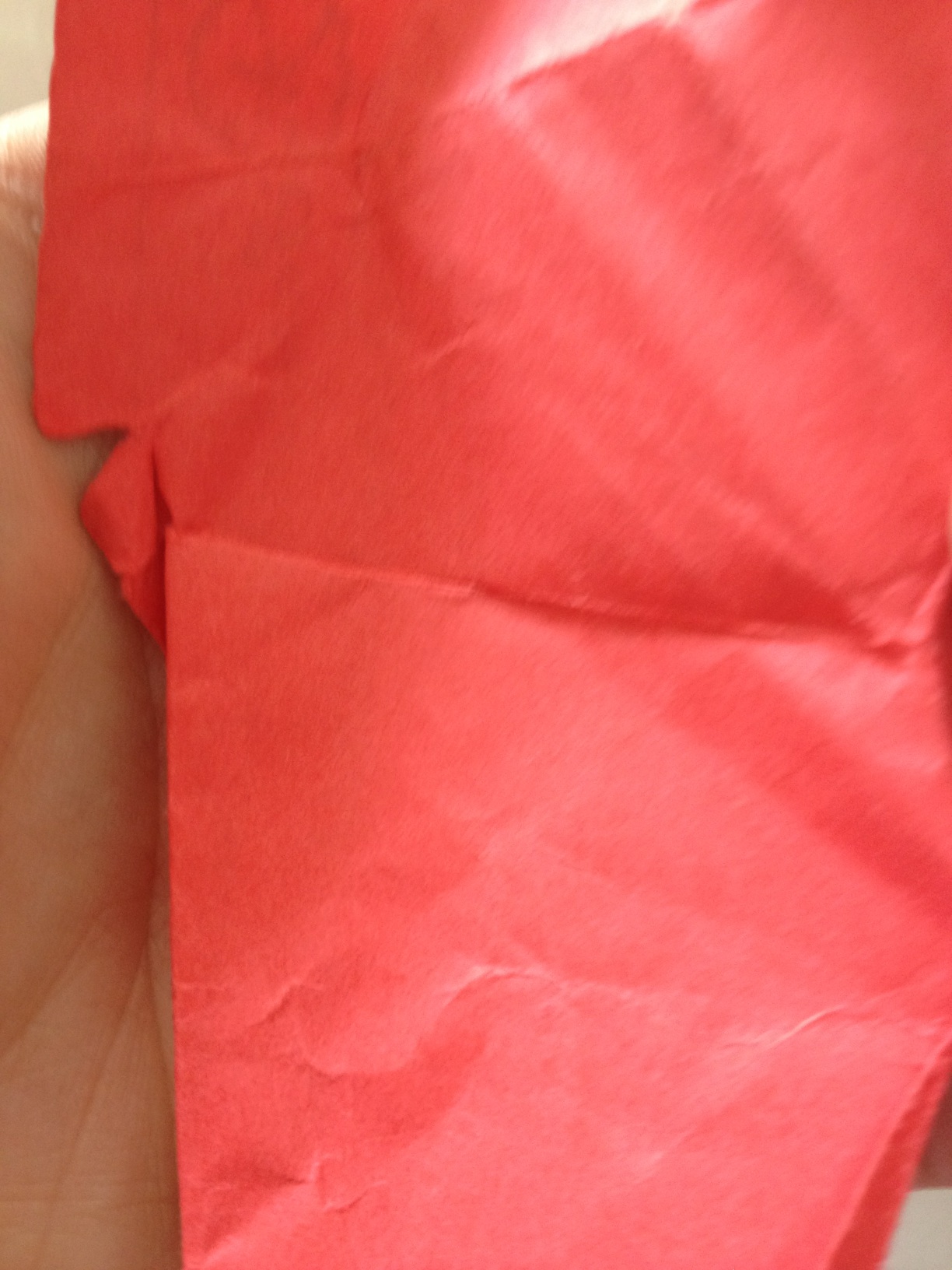 A photo captured by a person who is blind. A computer-generated caption for this photo is: A close up of a person ' s hand.