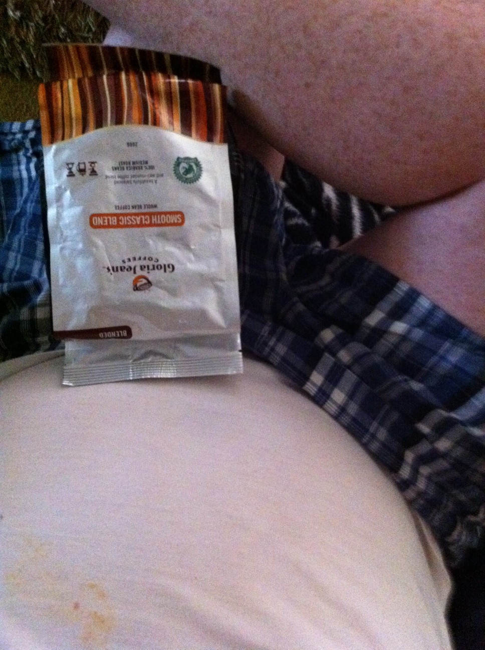 A photo captured by a person who is blind. A computer-generated caption for this photo is: A close up of a person holding a book.