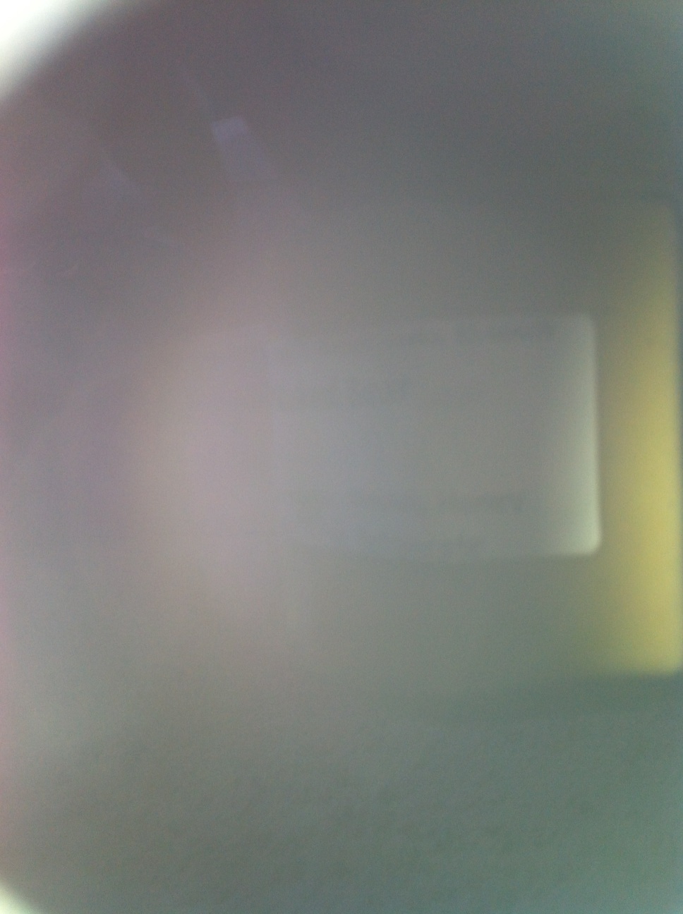 A photo captured by a person who is blind. A computer-generated caption for this photo is: A close up view of a white sky.