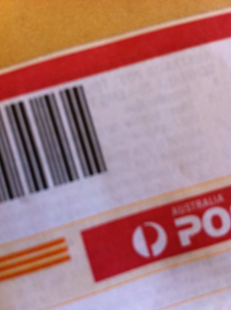 A photo captured by a person who is blind. A computer-generated caption for this photo is: A close up of a sign on a table.