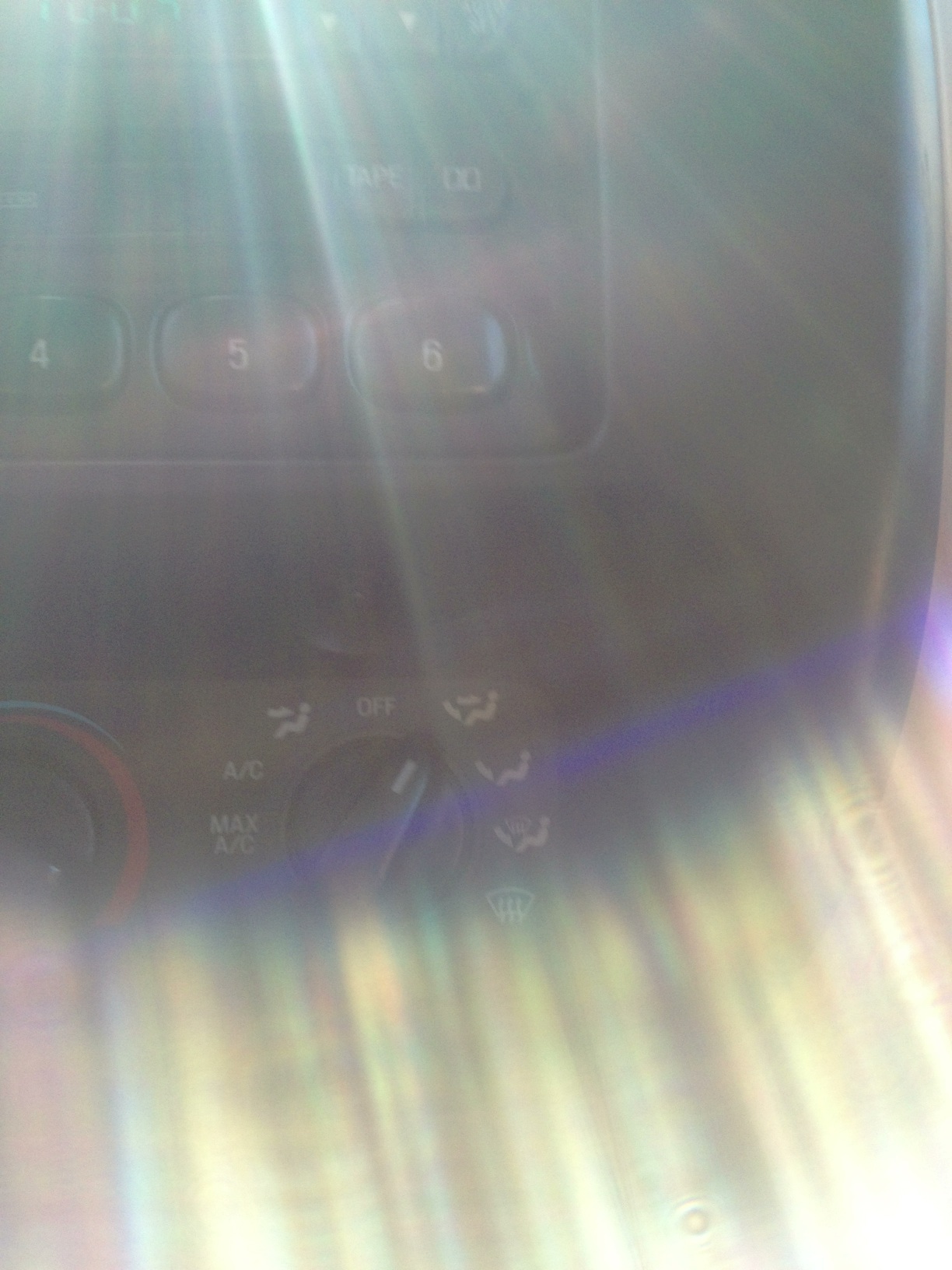 A photo captured by a person who is blind. A computer-generated caption for this photo is: A close up of an image of a window.