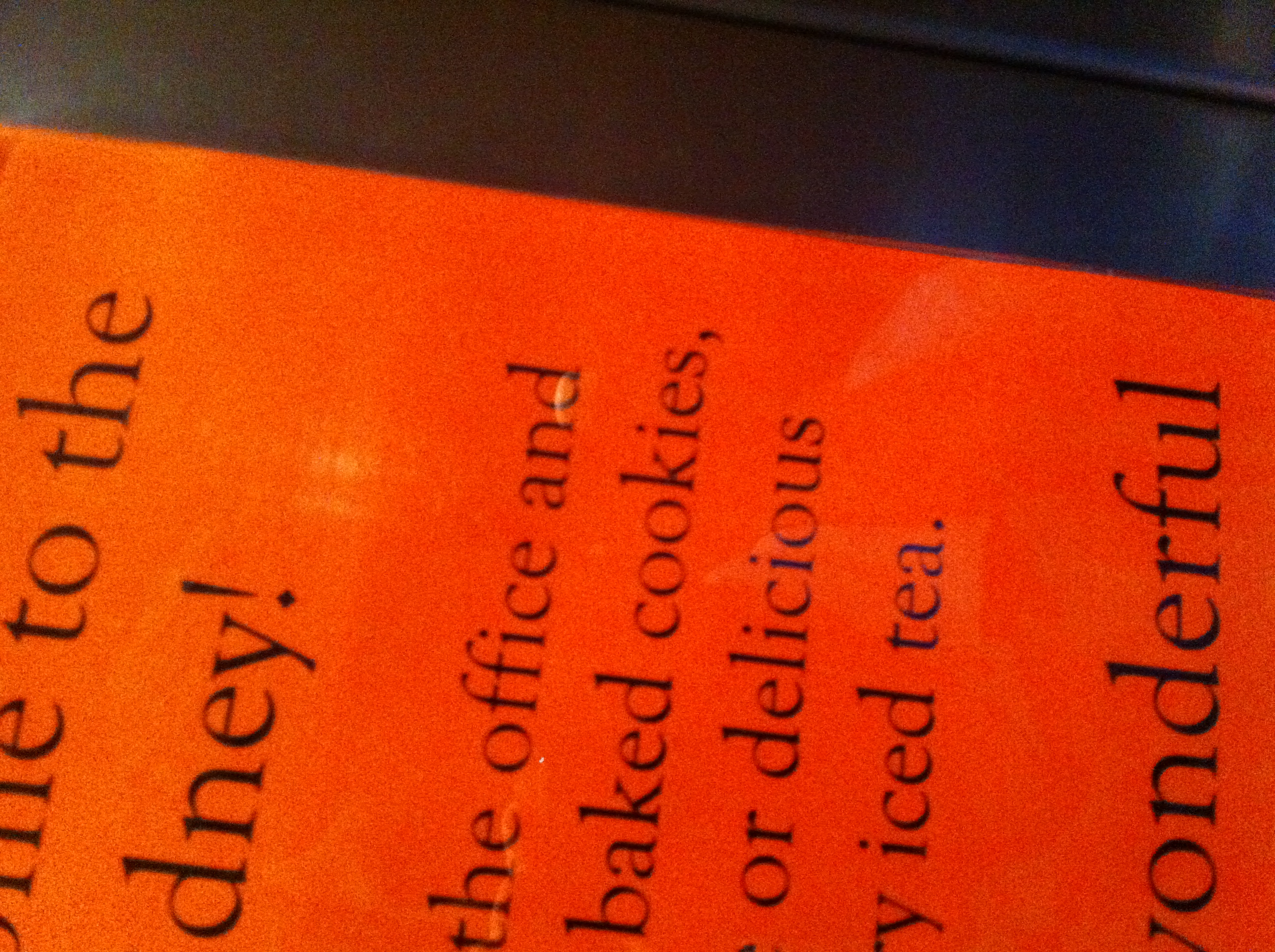 A photo captured by a person who is blind. A computer-generated caption for this photo is: A close up of a sign on a wall.