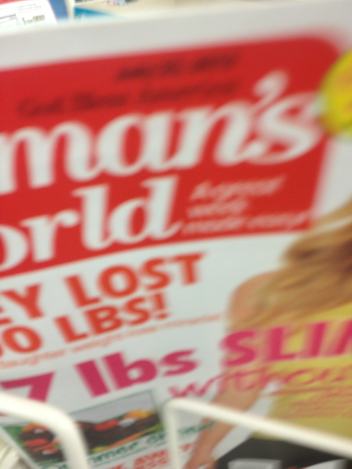 A photo captured by a person who is blind. A computer-generated caption for this photo is: A close up of a sign on a table.